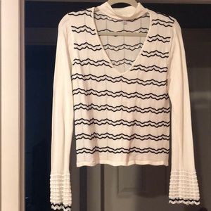 White and black top.